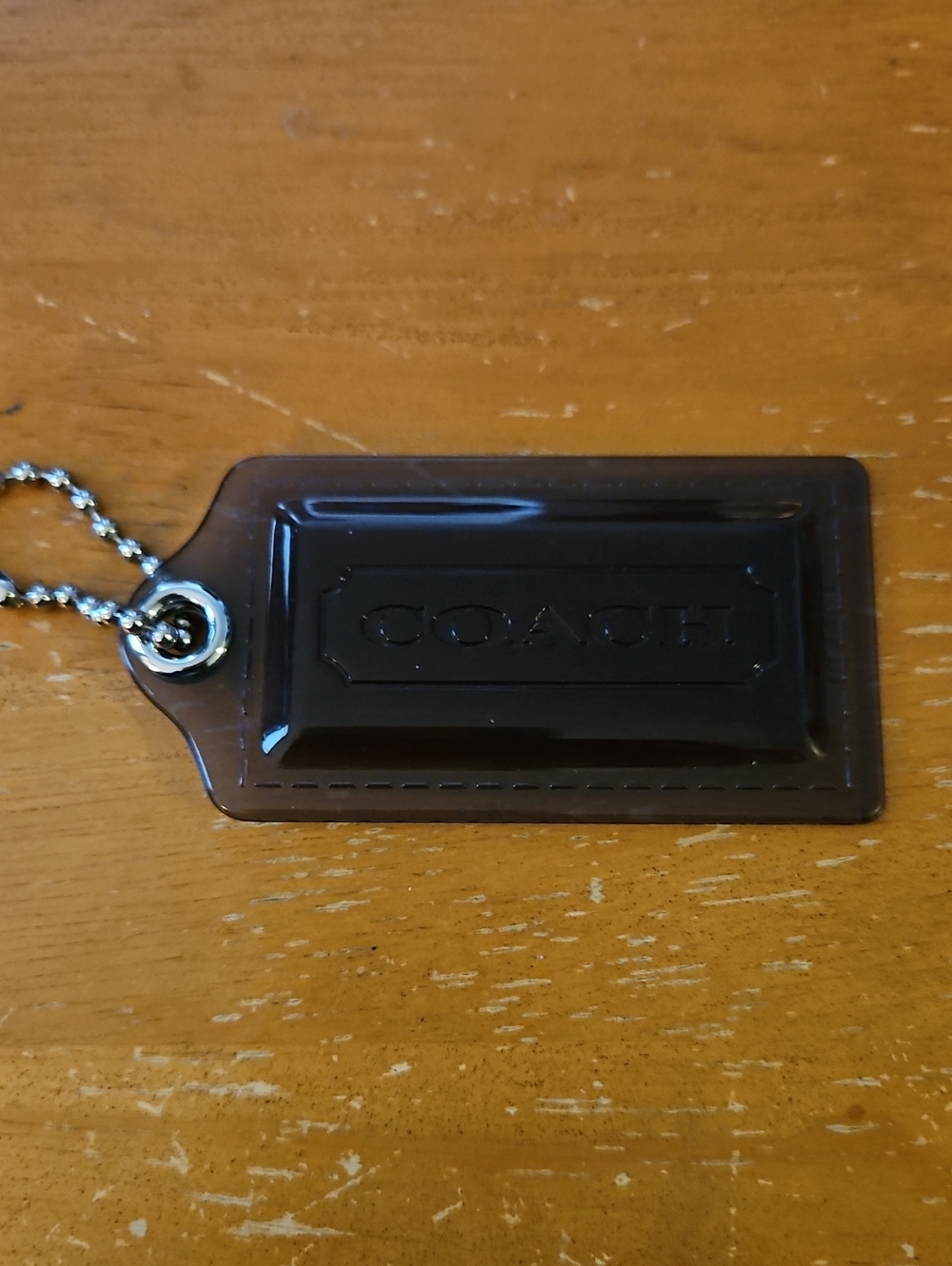 Coach Poppy Smoky Black Acrylic Logo Hang Tag with Silver Chain